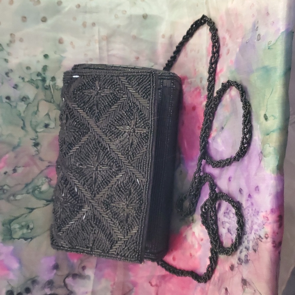 Woman’s Black Beaded Evening Clutch